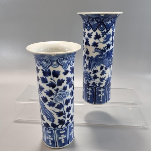 176 - Pair of 19th century Chinese porcelain blue and white cylinder vases with a double Phoenix and Peony... 