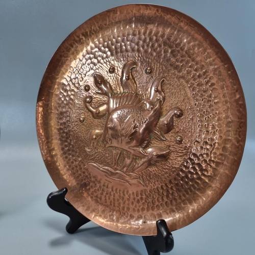 180 - Three Arts & Crafts repoussé decorated Newlyn copper items to include: fish pen tray 26x7cm approx, ... 