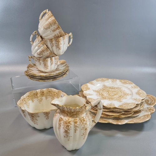 182 - Late 19th century 36 piece Wileman & Co. fluted and shell design tea set comprising: ten cups and sa... 