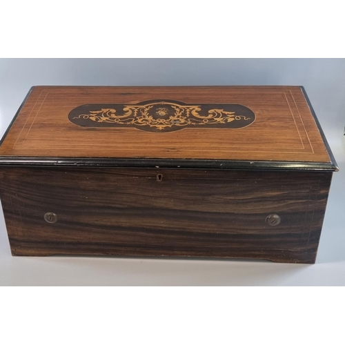 186 - 19th century rosewood, mixed woods and ebonised Swiss musical box, playing eight airs, with brass cy... 