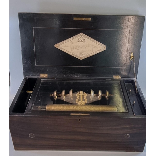 186 - 19th century rosewood, mixed woods and ebonised Swiss musical box, playing eight airs, with brass cy... 