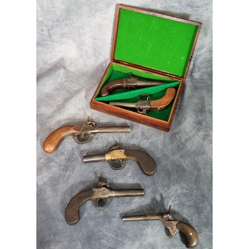 195 - A Collection of 19th century percussion pocket pistols, to include: pistol with turn off barrel and ... 