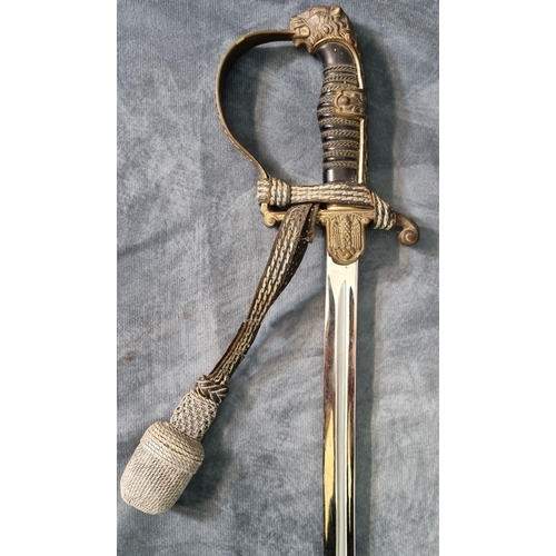 196 - WWII period German Third Reich period Naval Officer's sword, having 84cm slightly curved fullered si... 