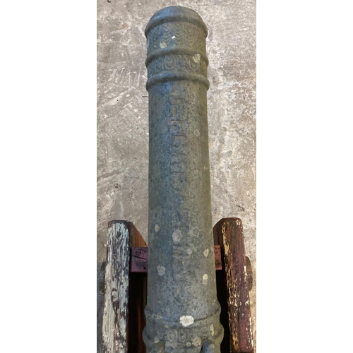 196A - Cast iron, probably French cannon with decorative banding and loop handles over marked 'Gavre Au Cha... 