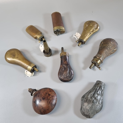 207 - Collection of assorted pistol flasks of various shapes and designs including pineapple, scale finish... 