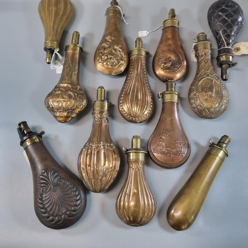 209 - Interesting collection of 18th and 19th century brass and other metal powder and shot flasks, all ha... 