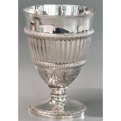 218 - George III silver goblet, the ribbed central body above relief acanthus leaf decoration standing on ... 