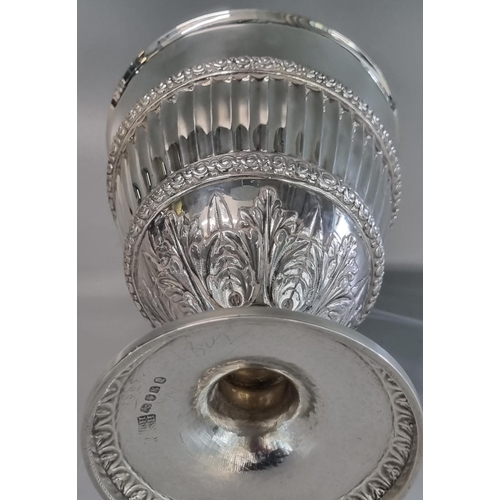 218 - George III silver goblet, the ribbed central body above relief acanthus leaf decoration standing on ... 