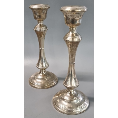 224 - Pair of 20th century silver candlesticks, of baluster form, standing on circular bases, by B & Co. B... 