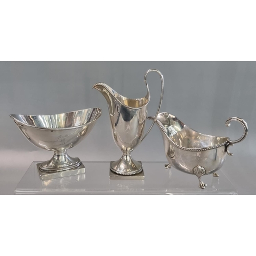 225 - Three items of silver, to include: boat shaped salt on rectangular base, London hallmarks makers ini... 