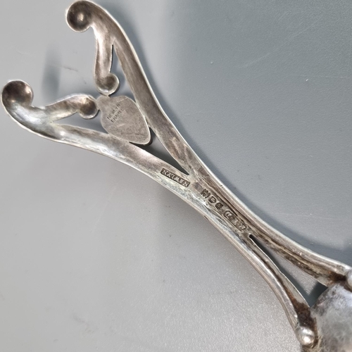 227 - Arts and Crafts Newlyn beaten silver spoon hallmarked for London 1910, maker's mark 'R.T.D.', probab... 