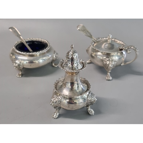 228 - Mixed silver classical design condiment set on lion mask mounts and paw feet, some pieces by James D... 