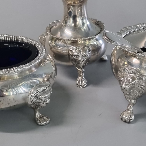 228 - Mixed silver classical design condiment set on lion mask mounts and paw feet, some pieces by James D... 