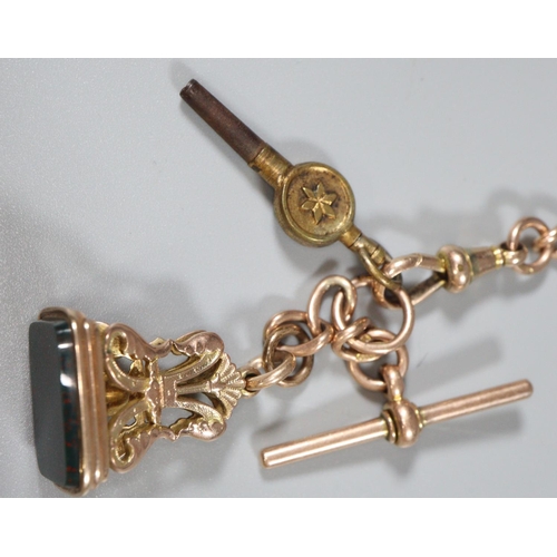 249 - 9ct gold pocket watch T bar chain with bloodstone fob and watch key.  Total weight 44g approx.   (B.... 