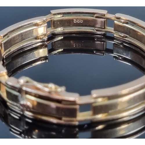 257 - 14ct gold chunky gentleman's bracelet marked 585.  Length 20.5cm approx.  58.7g.  (B.P. 21% + VAT)