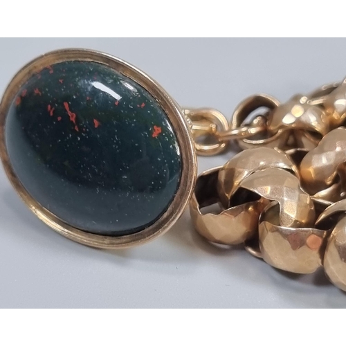 259 - Victorian 9ct gold curb link bracelet with large oval bloodstone fob.  Total weight 27.5g approx.   ... 