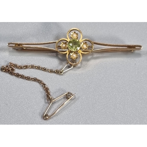 264 - Edwardian 15ct gold Peridot and Seed Pearl brooch.  5.7cm long approx.  4.8g approx.  (B.P. 21% + VA... 