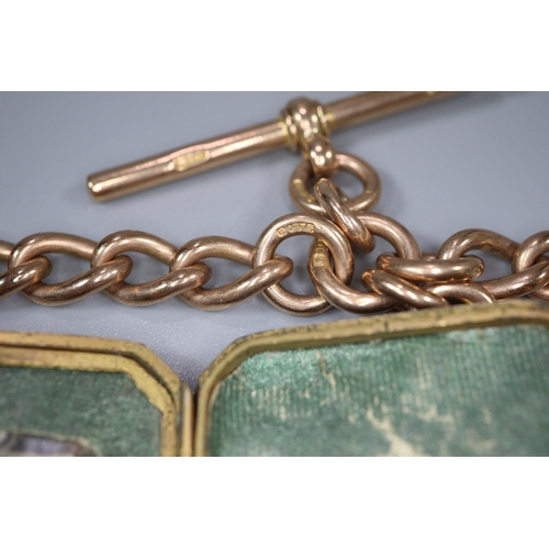 269 - 9ct gold curb link T bar pocket watch chain with engraved octagonal locket.  44g approx.   (B.P. 21%... 