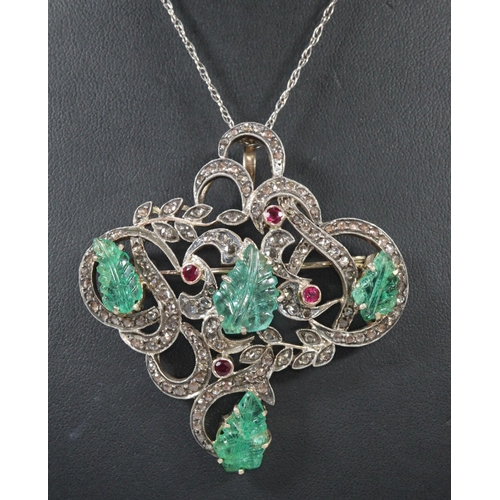 277 - Edwardian diamond, ruby and emerald pendant brooch on silver chain, the brooch with foliate decorati... 