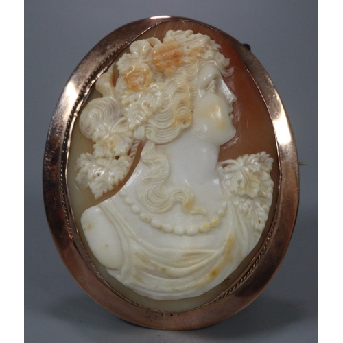 282 - Large Victorian 9ct gold cameo portrait brooch.  7x6cm approx.  Together with another 9ct gold cameo... 