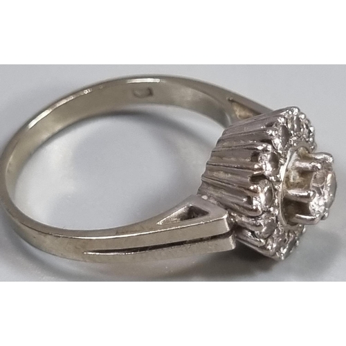 284 - 18ct white gold diamond cluster ring.  6.2g approx.  Ring size N 1/2.   (B.P. 21% + VAT)