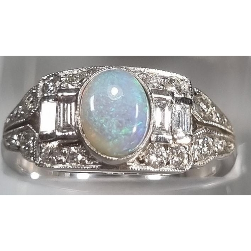 285 - 18ct white gold Art Deco style ring with central oval opal surrounded by baguette and other diamonds... 