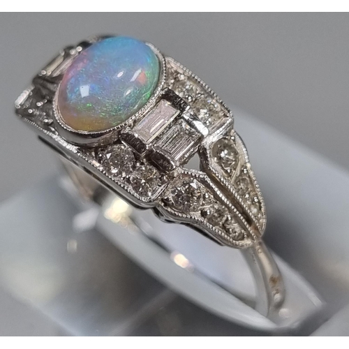 285 - 18ct white gold Art Deco style ring with central oval opal surrounded by baguette and other diamonds... 