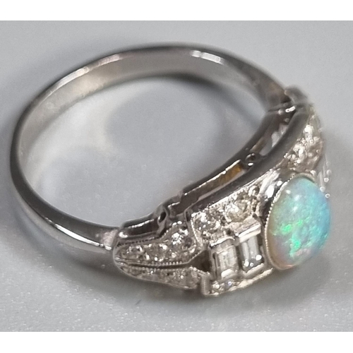 285 - 18ct white gold Art Deco style ring with central oval opal surrounded by baguette and other diamonds... 