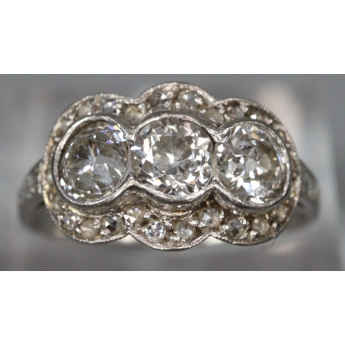 292 - White gold Art Deco triple cluster diamond ring, appearing unmarked.  Size M1/2.  3.3g approx.  (B.P... 