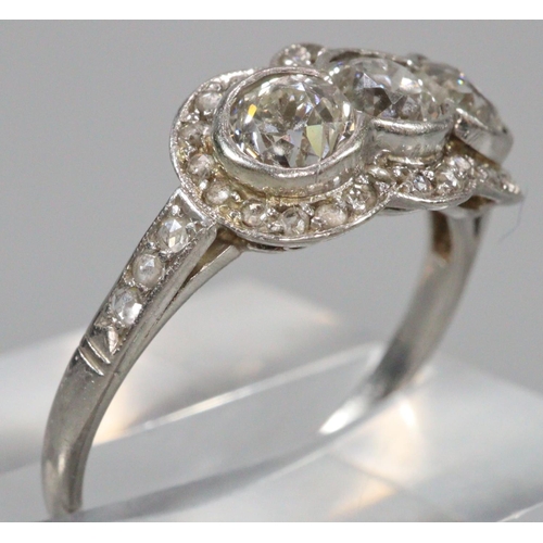 292 - White gold Art Deco triple cluster diamond ring, appearing unmarked.  Size M1/2.  3.3g approx.  (B.P... 