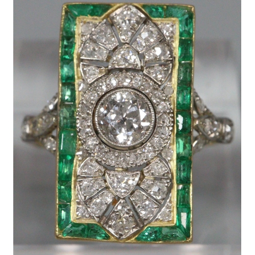 Gold Art Deco diamond and emerald ring of rectangular form, appearing unmarked.  Size M.  4.5g approx.  (B.P. 21% + VAT)