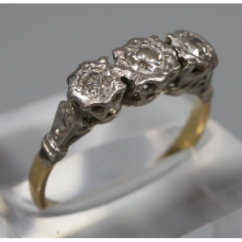 305 - 18ct platinum three stone diamond ring, marked 18ct Plat.  Size L.  2.5g approx.   (B.P. 21% + VAT)