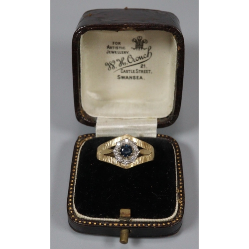 306 - 18ct gold bark finish diamond and sapphire ring. Size K1/2.   4.6g approx.  (B.P. 21% + VAT)