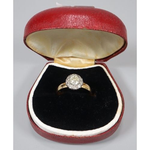 307 - 18ct gold diamond cluster ring, the central stone 0.45carat approx.  Size Q1/2.  3.4g approx.  (B.P.... 