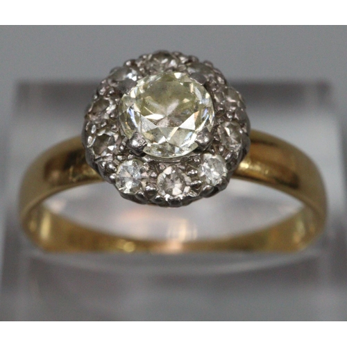 307 - 18ct gold diamond cluster ring, the central stone 0.45carat approx.  Size Q1/2.  3.4g approx.  (B.P.... 