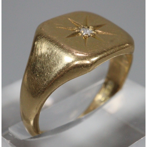 308 - 18ct gold gents signet ring inset with a small diamond chip.  Size N.  7.5g approx.  (B.P. 21% + VAT... 