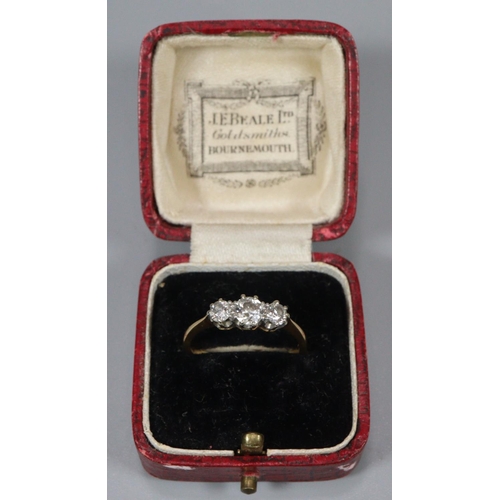 312 - 18ct gold three stone diamond ring.  Ring size N1/2.  3.1g approx.   (B.P. 21% + VAT)