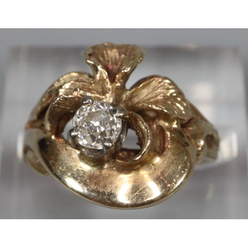 315 - Yellow metal floral design diamond solitaire ring. 6.1g approx.  Ring size J1/2.   0.2ct approx.  (B... 