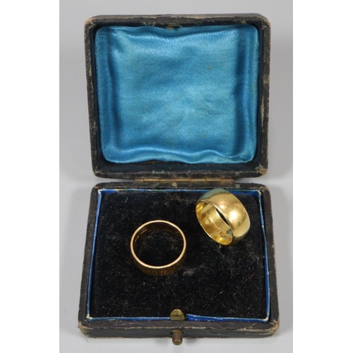 316 - Two 22ct gold wedding bands, one of textured design.  13.4g approx.  (B.P. 21% + VAT)