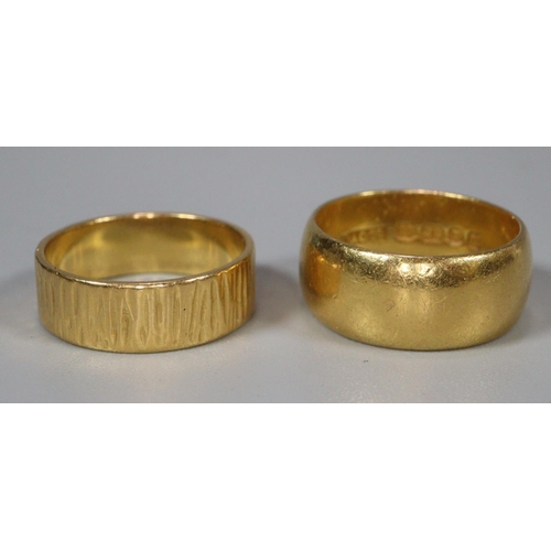 316 - Two 22ct gold wedding bands, one of textured design.  13.4g approx.  (B.P. 21% + VAT)