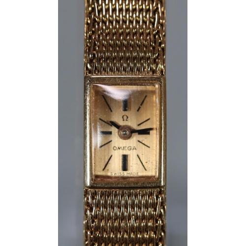 324 - Vintage ladies Omega 18ct gold slimline design wristwatch, the rectangular face marked 'Omega Swiss ... 