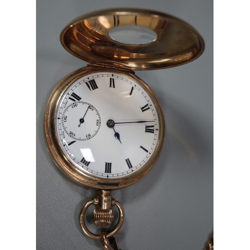 332 - 9ct gold half hunter keyless lever pocket watch with white enamel Roman face having seconds dial, Go... 