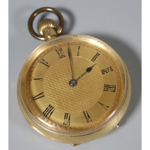 333 - 18ct gold open faced keyless fob watch with engine turned Roman face, 3.5cm diameter approx.  Weight... 