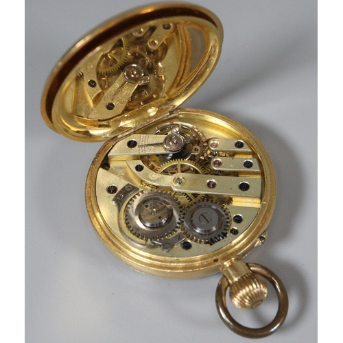 333 - 18ct gold open faced keyless fob watch with engine turned Roman face, 3.5cm diameter approx.  Weight... 