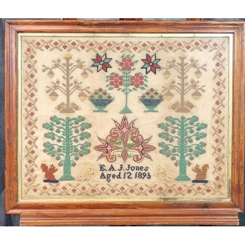 349 - Late Victorian child's sampler, E. A. J. Jones, Aged 12, dated 1895, overall decorated with flowers,... 