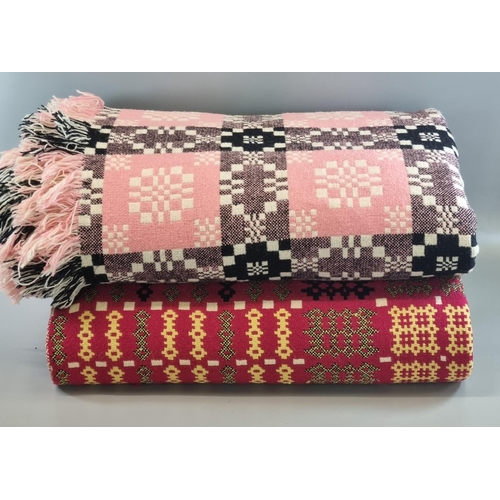 350 - Two vintage woollen Welsh tapestry blankets or carthen; one pink ground with fringed edge and 'Gerno... 