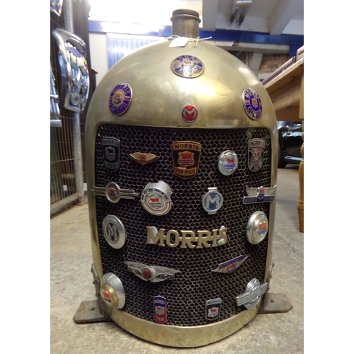 358 - 1920s Bullnose  Morris Oxford brass radiator and grill mounted with assorted Morris vehicle badges. ... 