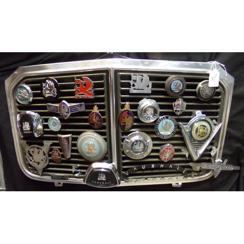 360 - Post war Vauxhall motorcar radiator grill mounted with a varied collection of Vauxhall car badges, v... 