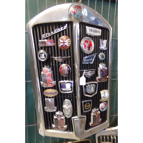 370 - Triumph chrome radiator grill set with a good variety of Standard and Triumph vehicle badges, variou... 