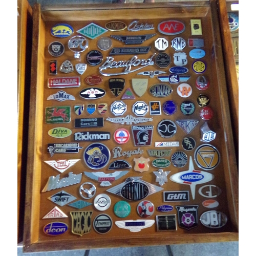 376 - A good glazed case containing various and assorted mainly British motor vehicle enamel badges and ot... 